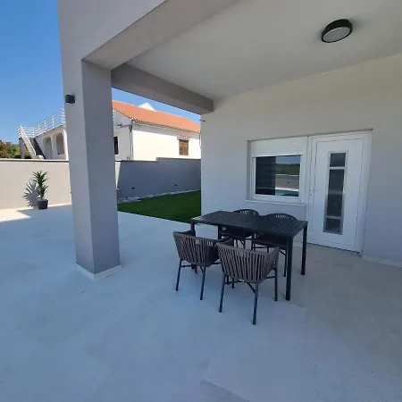 Апартаменты Villa Madison, Spacious Sea View Apartments Near Zadar With Heated Pool